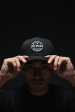 RHEO Seal of Greatness Trucker Hat